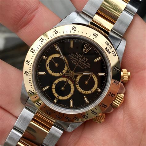 rolex daytona half gold black face|rolex daytona white gold price.